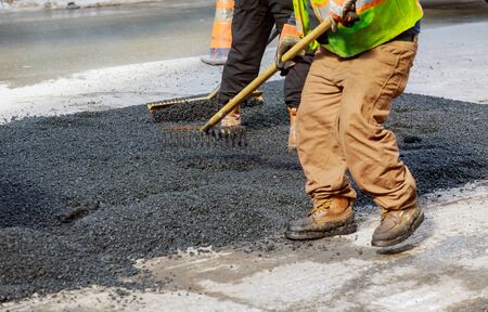 Fresh asphalt construction street resurfacing industrial laying asphalt on new road construction...