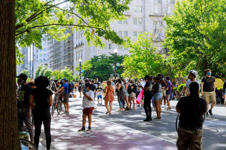 WASHINGTON D.C., USA - MAY 31, 2020: Protesters march in WASHINGTON D.C. during a rally responding to the death of Minneapolis man George Floyd at the hands of police on White House president Donald Trumpのeditorial素材
