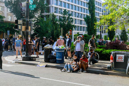 WASHINGTON D.C., USA - MAY 31, 2020: Protest Black Lives Matter protesters march after death George Floyd, group standing against White House Donald Trump president USのeditorial素材