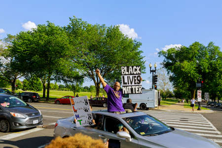 WASHINGTON D.C., USA - MAY 31, 2020: Protest after George Floyd death, Black Lives Matter group standing against White House president Donald Trumpのeditorial素材