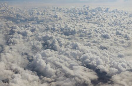 Beautiful with white clouds blue sky sea on a view from an airplane