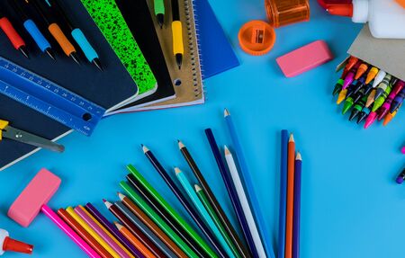 School and education supplies, notebooks, colored pencils