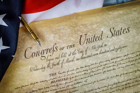 Preamble to the Constitution of the United States of America of closeup of ruffled American flagの写真素材