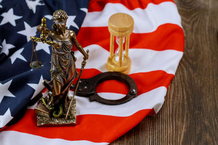 Law United States of America, statue of Lady Justice of gavel on table justice United States of America Flagの写真素材
