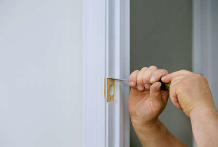 Wood chisel cutting out hole in for the door lock working chisel punchの写真素材