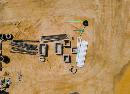 An aerial view of the urban sewerage infrastructure and underground utility construction for pipes...
