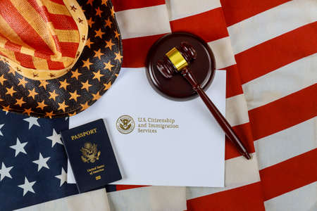 US deportation Immigration justice and law concept American flag Official department USCIS Department of homeland Security United States Citizenship Immigration Servicesの写真素材
