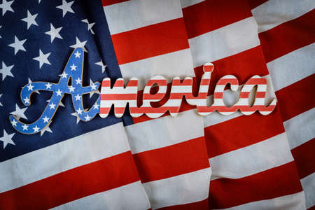 America sign decorated letter with patriotism federal holiday of Labor Day Memorial Day of the American flag backgroundの写真素材