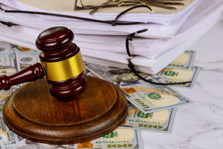 Justice lawyers desk judge's hammer, file folder law office working law documentの写真素材