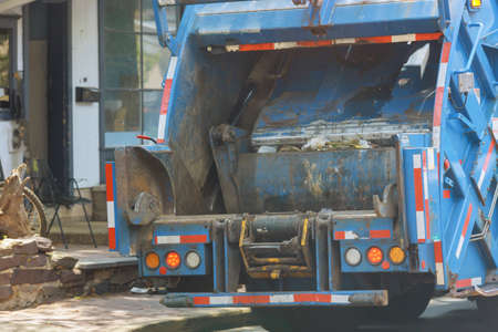 Urban municipal recycling garbage collector truck waste trash bin in industrial vehicle