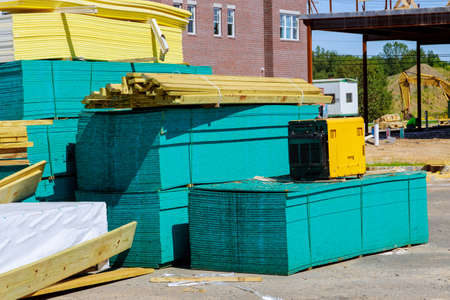 Stacked wooden building materials stack of boards wood frame beam construction