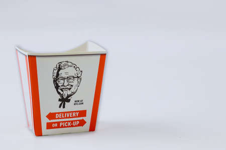 CLEVELAND OH US 15 SEPTEMBER 2020: Box with KFC logo on table in KFC Restaurantのeditorial素材