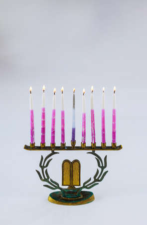 Menorah of Hanukkah with burning candles is Jewish holiday for traditional symbolの写真素材