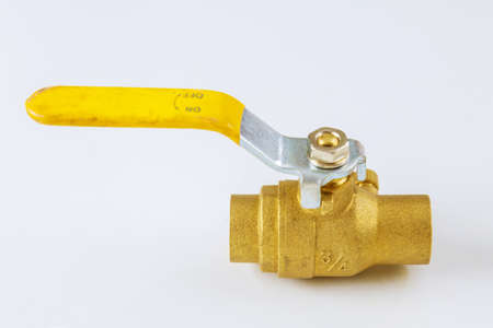 Water plumbing brass fitting on a water tap on isolated white background.