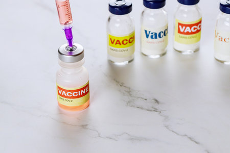 Vaccine bottle and syringe for fight injection Sars-cov-2 coronavirus covid-19の写真素材