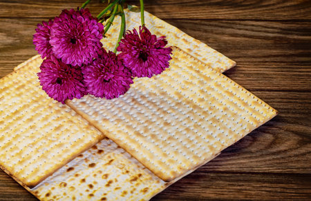 Passover matzoh jewish holiday bread over old wooden table background.の写真素材