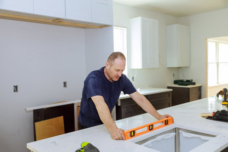Leveling with countertops of making a kitchen modern domestic cabinetsの写真素材