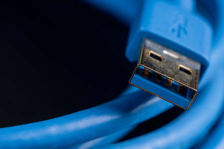 Male connector blue cable USB3.0 on isolated white backgroundの写真素材