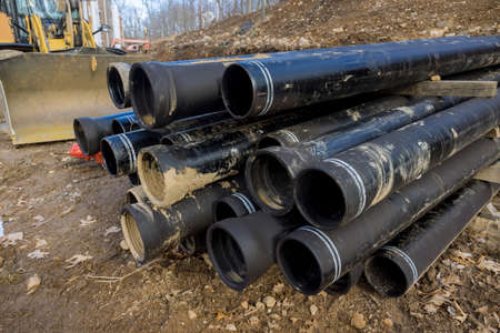 Black plastic water pipes PVC on installation of under in residential property the water supply...