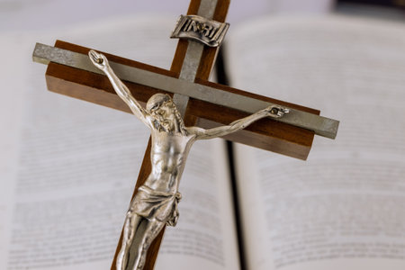 Open on the Holy bible with cross of the Christian cross the hope of mankind for salvation Jesus on...