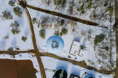 Sewage aerial view of a wastewater treatment processing plant sewage farm surrounding industrial of water treatment in winter seasonの写真素材