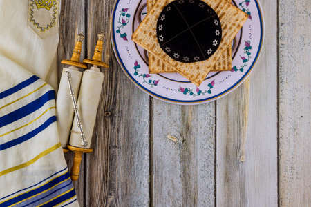 Jewish pesach attributes in composition a Torah Scrolls and passover matzah