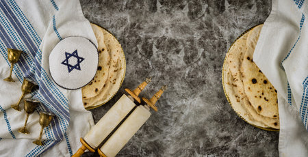 Orthodox Jewish family symbols with cup wine kosher matzah, traditional jewish passover holiday on...