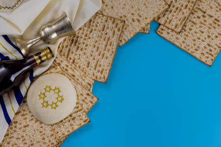Holiday jewish passover bread matzoh celebration and kipah with wine
