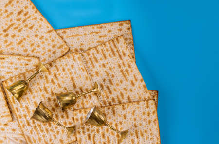 Matzoh, kosher four cup wine for jewish passover background.の写真素材