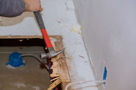 Restoration the floor repair plywood replacement in the house plywood layers for installation of flooringの写真素材