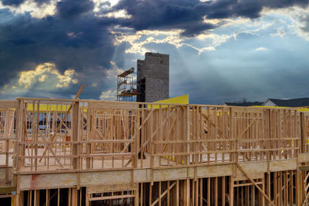 Exterior with wood framing beam of new house under construction beam woodの写真素材