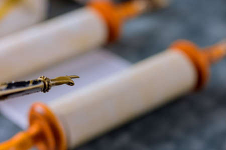 Judaic religion of Torah Scrolls with a pointer in a Jewish synagogueの写真素材