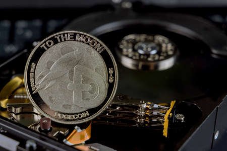 Coin Dogecoin on a cryptocurrency mining for computer Hard disk drives SSDの写真素材