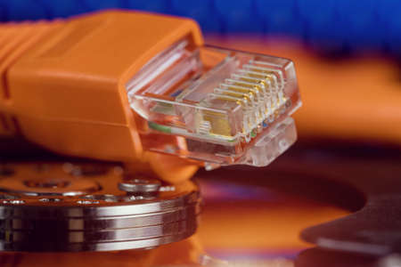 Selective focus at internet network cables connected with online storage files backup, transfer,...