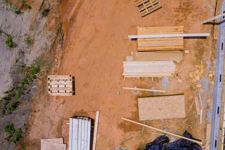 Stacked wooden building materials stack of boards wood frame beam constructionの写真素材