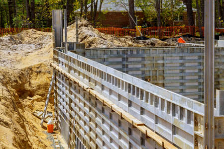 Building the installation of formwork under the foundation of a new house of a removable with metal holdersの写真素材