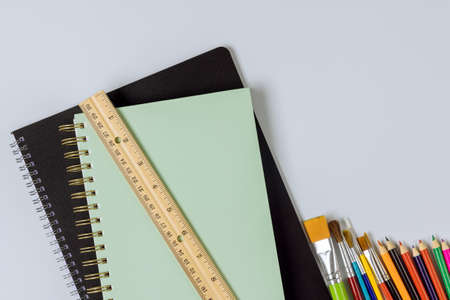 Various items school supplies placed on a concept ready for school.