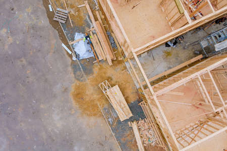 Framing of under construction wooden house building frame structure on a new development