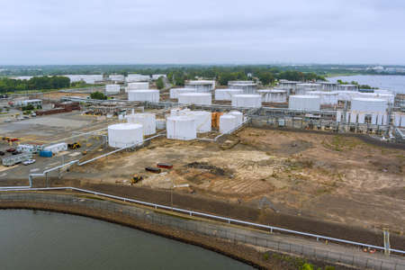 Aerial view close up Industrial view at oil refinery plant form industry zone with oil tank