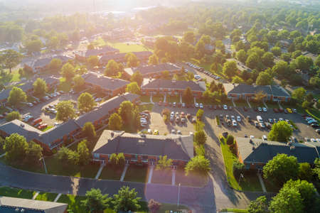 Panoramic view of view at sunset from the height roofs small town of houses of bird flight NJ USAの写真素材