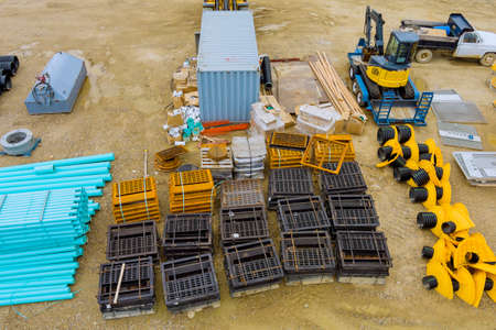 Aerial panoramic view at earthworks heavy equipment construction site for sewerge construction trench for laying external sewage drainage systemの写真素材