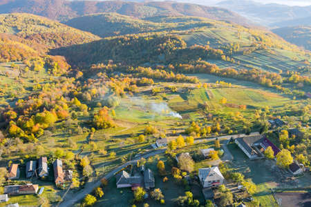 Aerial top view of the amazing countryside mountain scenery forest autumn landscape valleyの写真素材