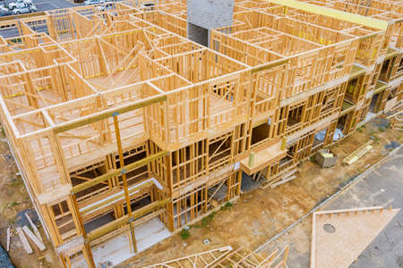 Aerial view the building construction wood framing beams of a new house under construction