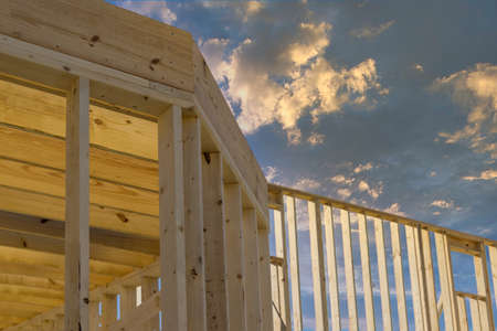 Framing of wood framework a new wooden house under construction