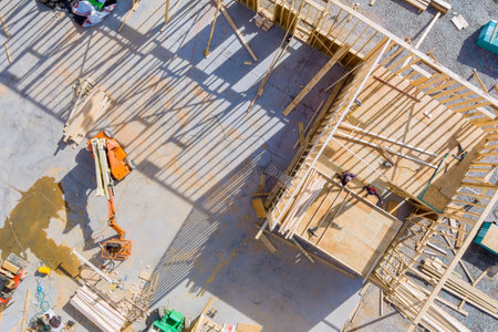 Wooden house in American beams the view of building frame structure on a new development framing of under constructionの写真素材