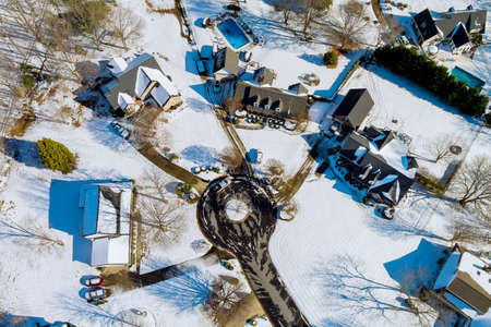 A perfect neighbourhood houses in suburb at winter the north America homes covered nice snow of...