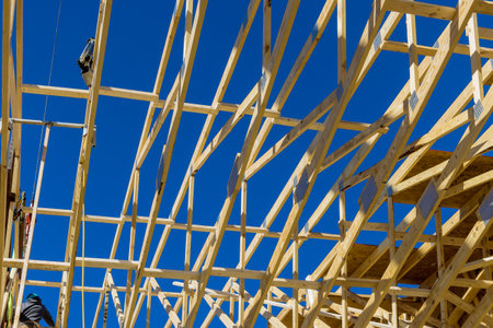 Framing of wood frame a new wooden house under construction
