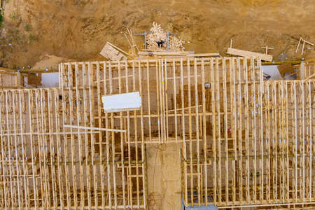 Floor joists in laying the second floor on a new apartment development under construction siteの写真素材