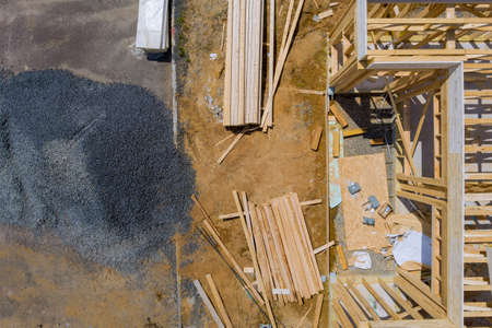 Aerial view the building construction wood framing beams of a new house under constructionの写真素材