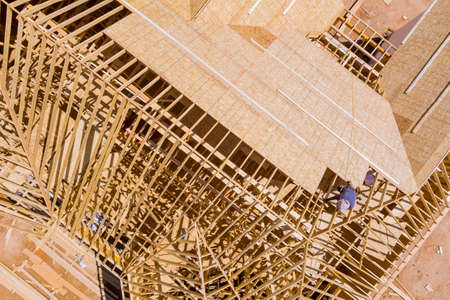 New home under construction with roof beam the plywood in top viewの写真素材